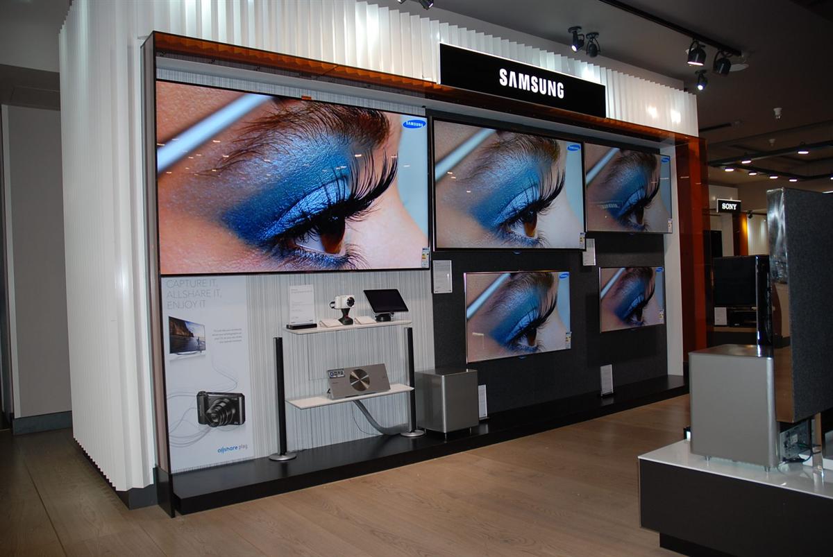 Samsung shop-in-shop display at Harrods London with TV wall and devices